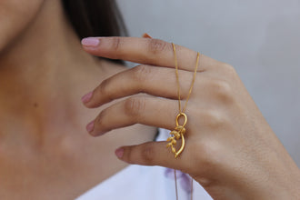 Petal Flair Gold Pendant – Stunning 22K Gold Pendant with Elegant Petal Design, Perfect for Adding a Touch of Glamour to Your Party Outfit